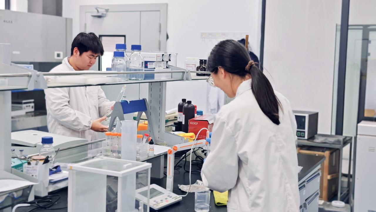 QC laboratory team conducting multi-parameter testing